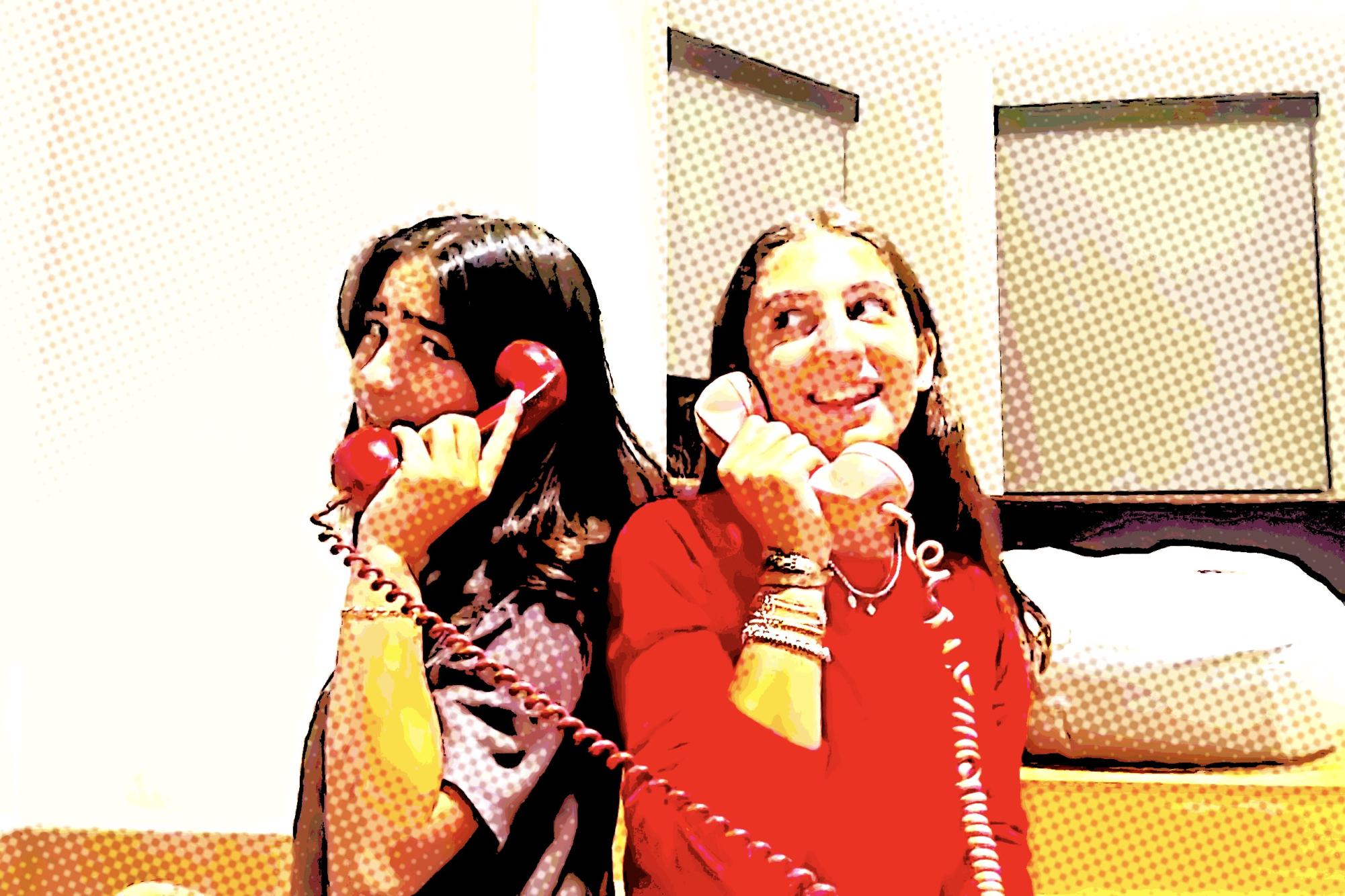 Students use old-fashioned telephones to symbolize the new phone policy preventing phone usage during the school day. The policy, adopted for the 2024-2025 school year, bans students from going on their phones from 8:30-3:05. 